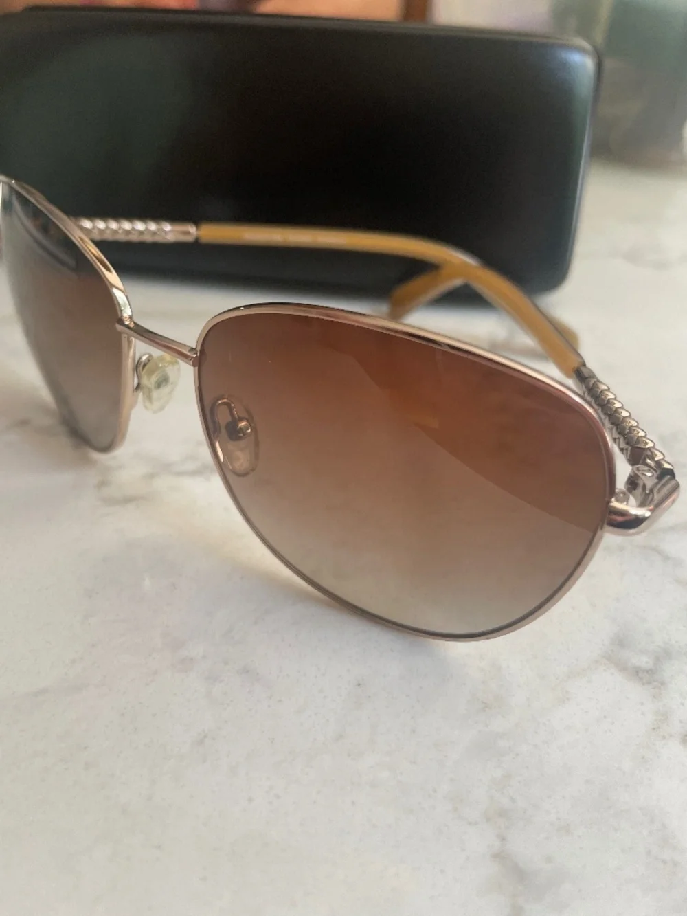 Elizabeth Arden sunglasses with case